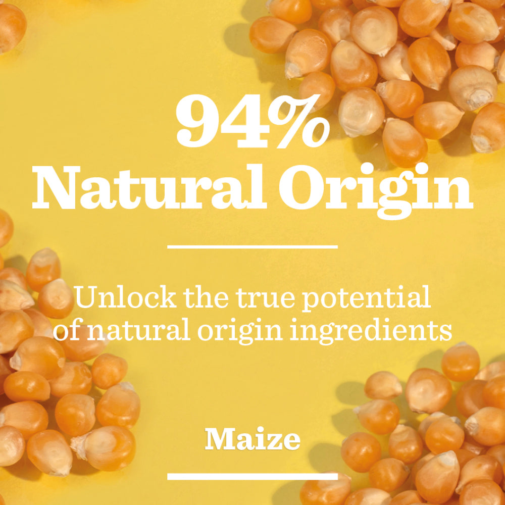 Yellow background with scattered maize kernels. Large text reads 94% Natural Origin, followed by: Unlock the true potential of natural origin ingredients to revitalise tired skin—with Energising Face Wash at the bottom.