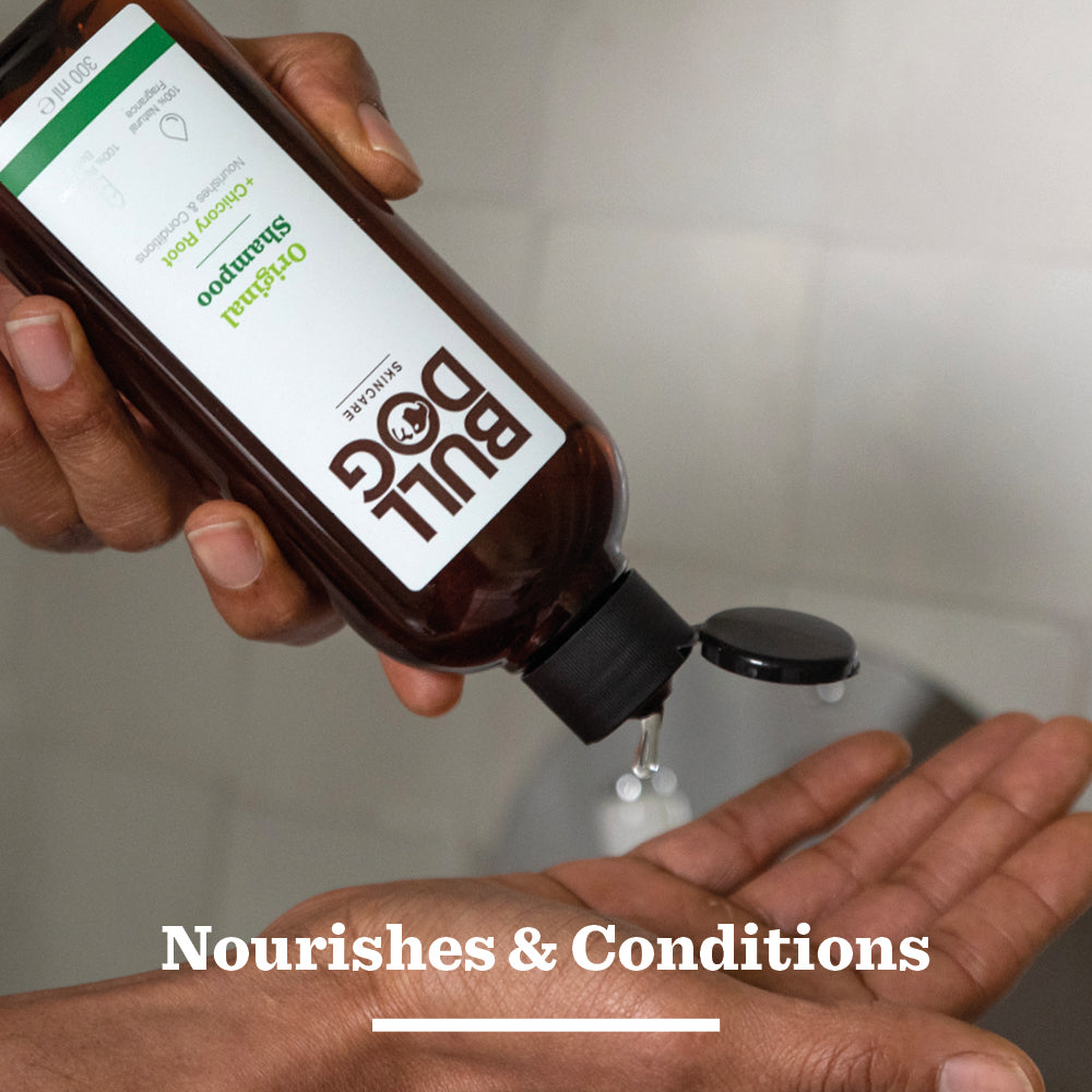A person dispenses Original Shampoo, featuring natural ingredients, from a brown bottle into their hand. The text at the bottom reads: Nourishes & Conditions.