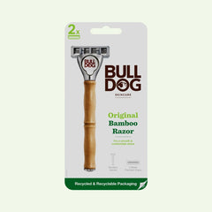 The Original Bamboo Razor is shown in its packaging, featuring a bamboo handle and 5 tempered steel blades for precision. Recycled and recyclable packaging is noted, with the razor and brand logo clearly visible.