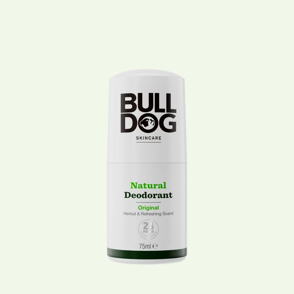The 75ml Bulldog Skincare Original Natural Deodorant stick features black and green text on a white label, standing upright against a light background—an essential addition to mens grooming routines.
