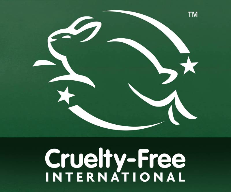 A white outline of a leaping rabbit with three stars circles above Cruelty-Free International on a green background, symbolizing cruelty-free certification for mens Travel Original Moisturiser with natural ingredients.